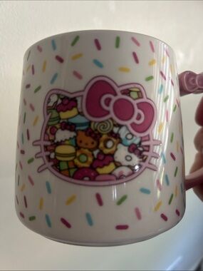 Hello Kitty Cafe White Mug with Pink Bow Handle and Multicolor Sprinkles